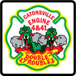 Left chest, embroidered in color, printed in white